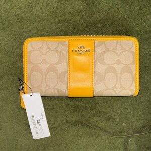 Coach Yellow and Tan Zip-Around Wallet